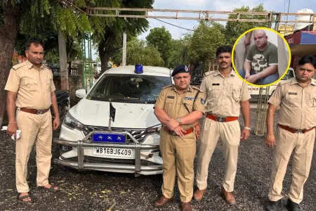 धौलपुर में फर्जी आईपीएस अधिकारी गिरफ्तार, नीली बत्ती लगी कार और हथियार जब्त