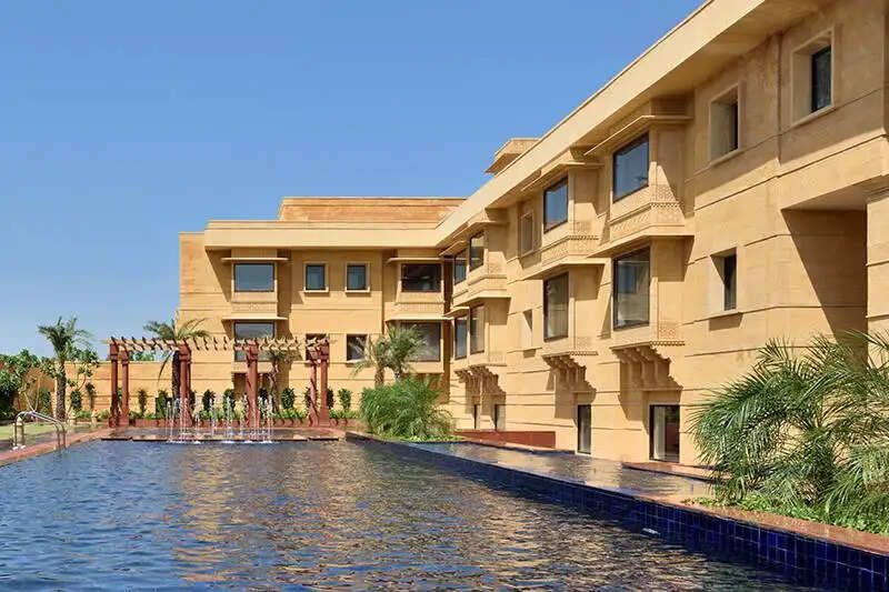 Famous for offering spectacular views of the city, Killa Bhawan is a heritage hotel that’s actually a part of the Jaisalmer Fort. Set in three bastions of the Sonar Qila, the hotel has 8 heritage rooms, all cheerfully adorned with a vibrant décor. The deluxe rooms feature antique pieces, marble floors and stately furniture that reflect the yesteryear glory of Jaisalmer. If you’re travelling with a large party, you can book a whole private section of the hotel, including 3 heritage rooms, 2 adjoining bathrooms and your own exclusive lobby and terrace! 